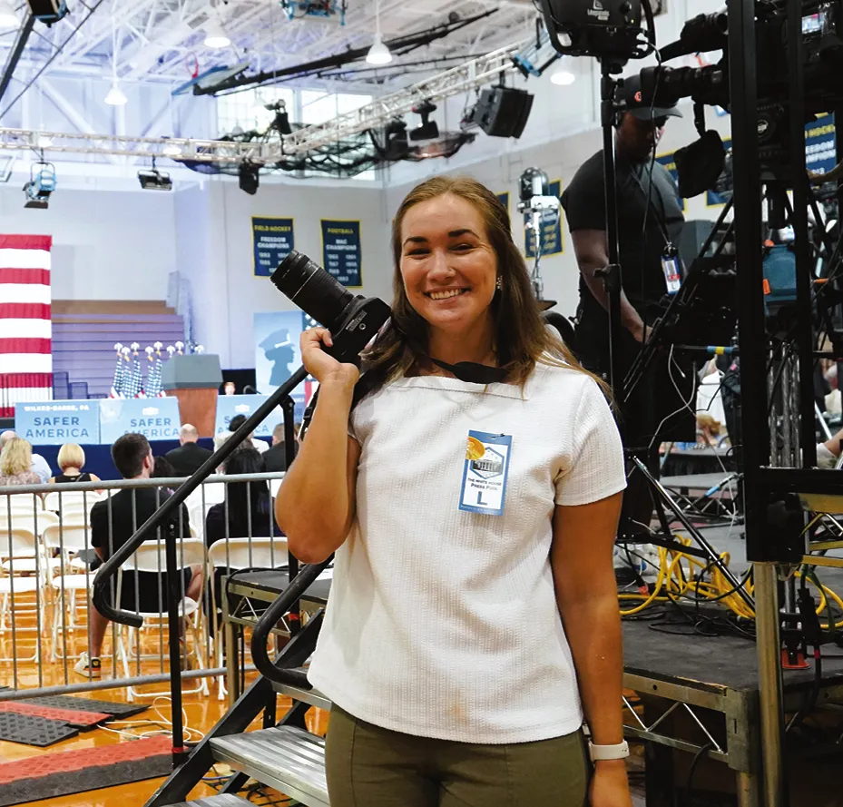 Ariel Reed getting her gear ready for the Joseph R. Biden visit to Wilkes.