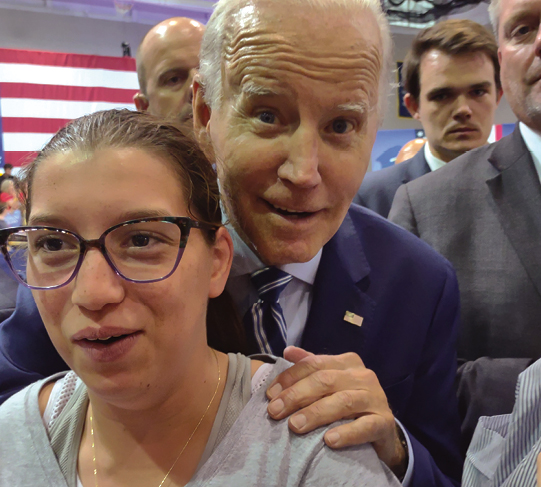 Chemistry and biochemistry professor Donald Mencer’s daughter, Kya Mence with President Biden