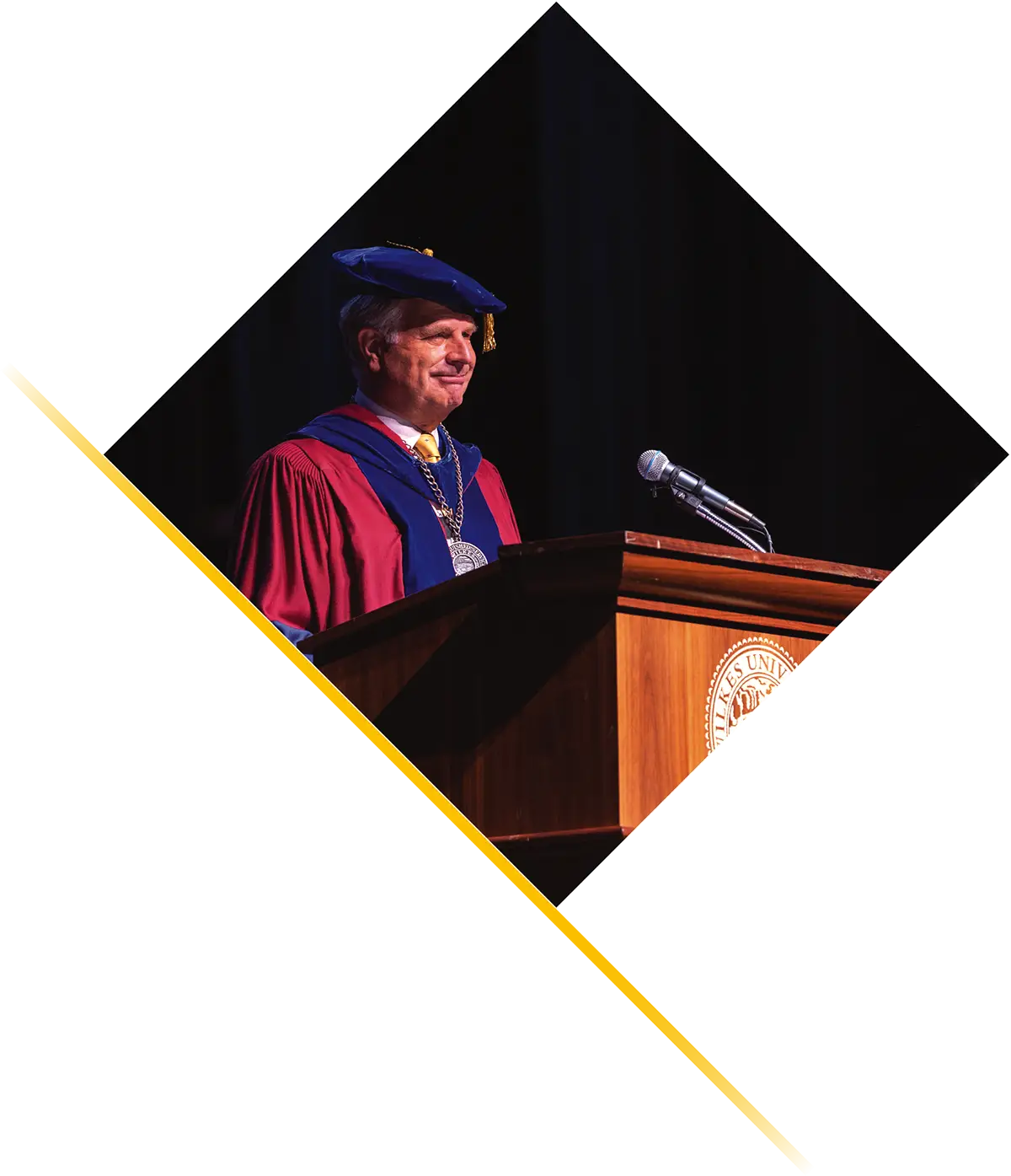 Paul Adams speaking at a commencement ceremony