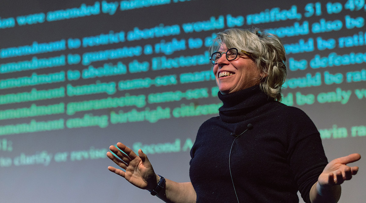 Jill Lepore in black turtleneck giving lecture