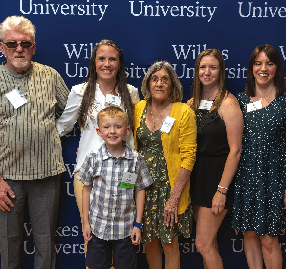 Kristi Barsby ’07, MBA ’09 with family