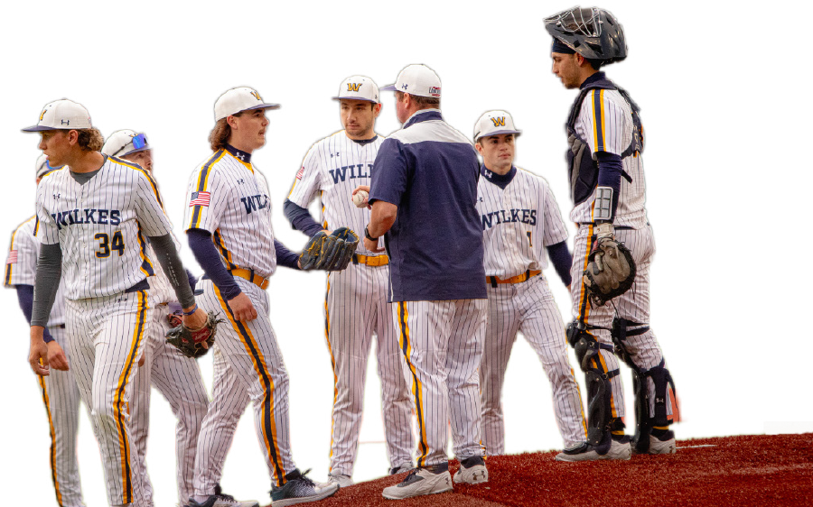 team in a huddle with coach