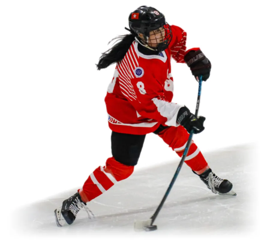 Ice hockey athlete wearing a red uniform and a black helmet, depicted in motion while playing hockey.