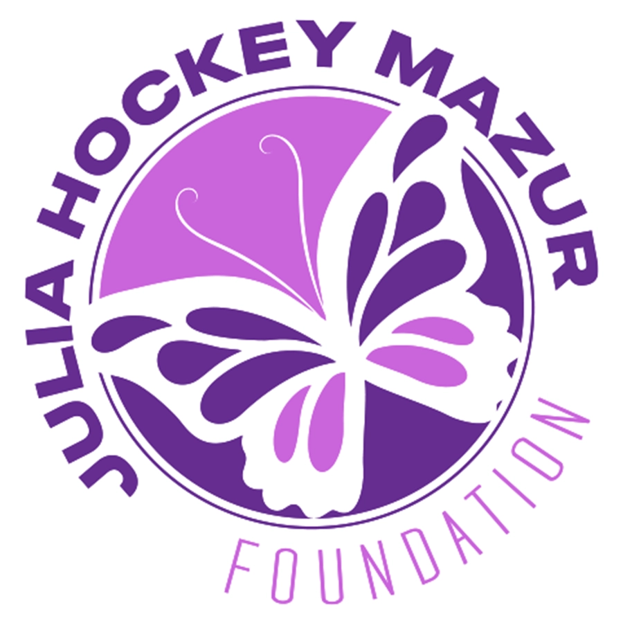 The logo for the Julia Hockey Mazur Foundation, featuring a stylized butterfly within a circle. The foundation's name is written in a ring around the butterfly.