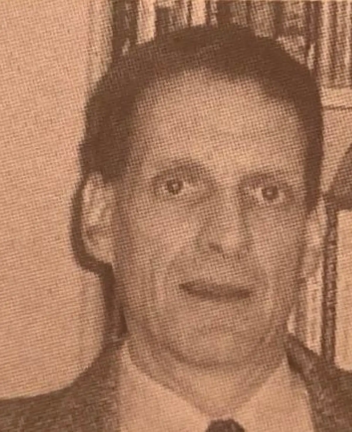 Grainy, sepia-toned head-and-shoulders portrait headshot of Joel Berlatsky, PhD