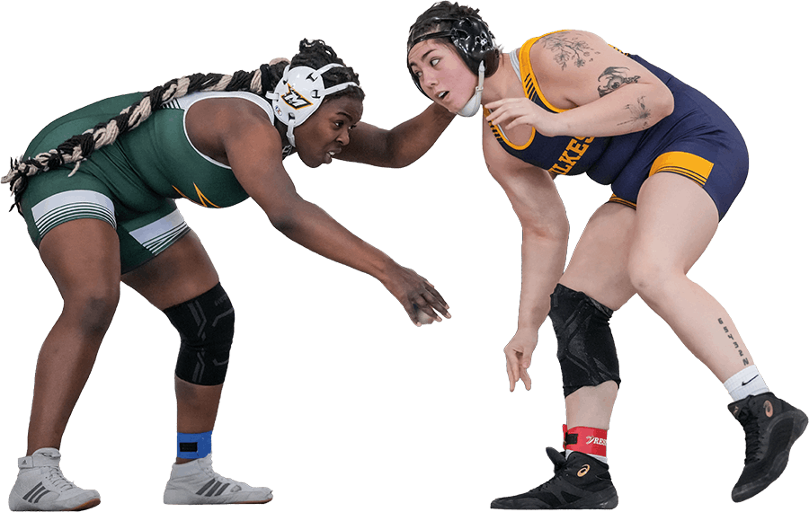 Two female wrestlers in singlets engage in a neutral standing tie-up during a match.